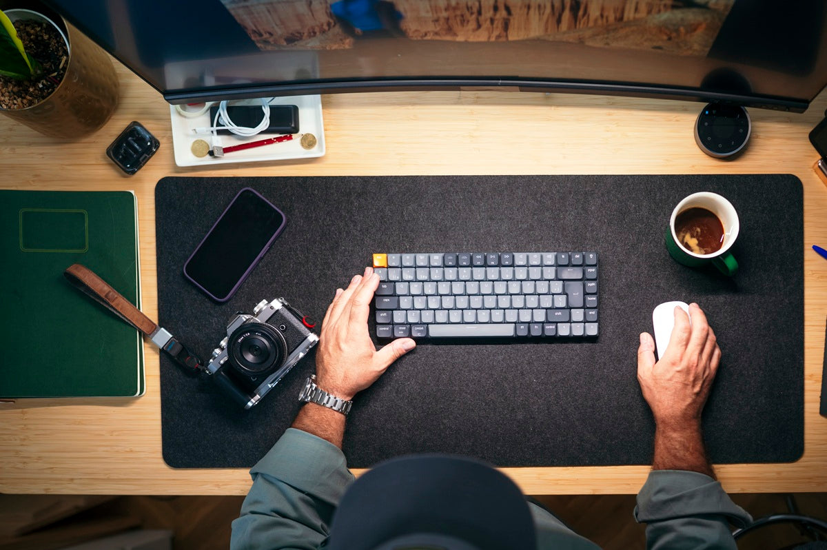 overhead view of best desk setup with useful accessories