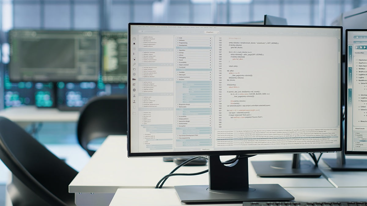 Single monitor setup displaying software development tools in a professional workspace designed for focused productivity